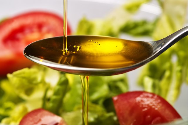 Drizzle sesame oil on salad.