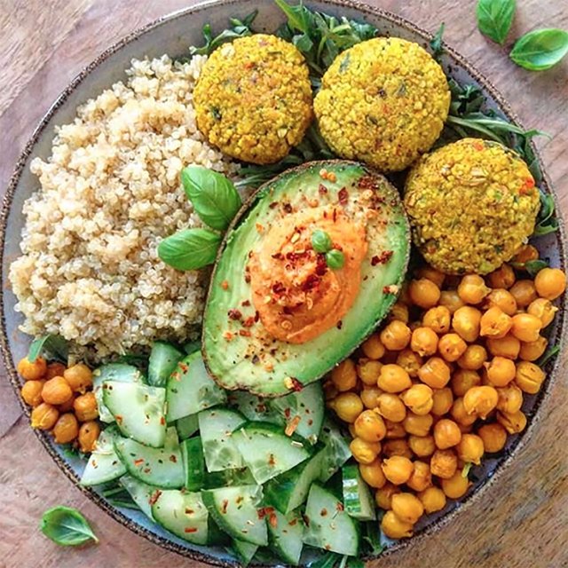 Chickpea patties along with roasted chickpeas form the base of this hearty Mediterranean bowl.