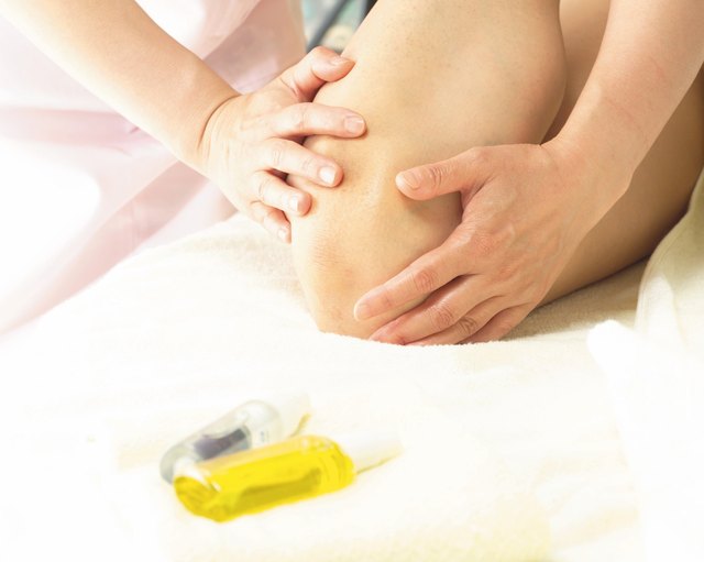Applying sesame oil to the skin.